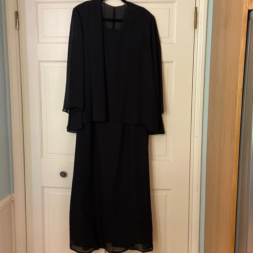 Black sleeveless full length dress with black sheer long sleeve top. Size 16W